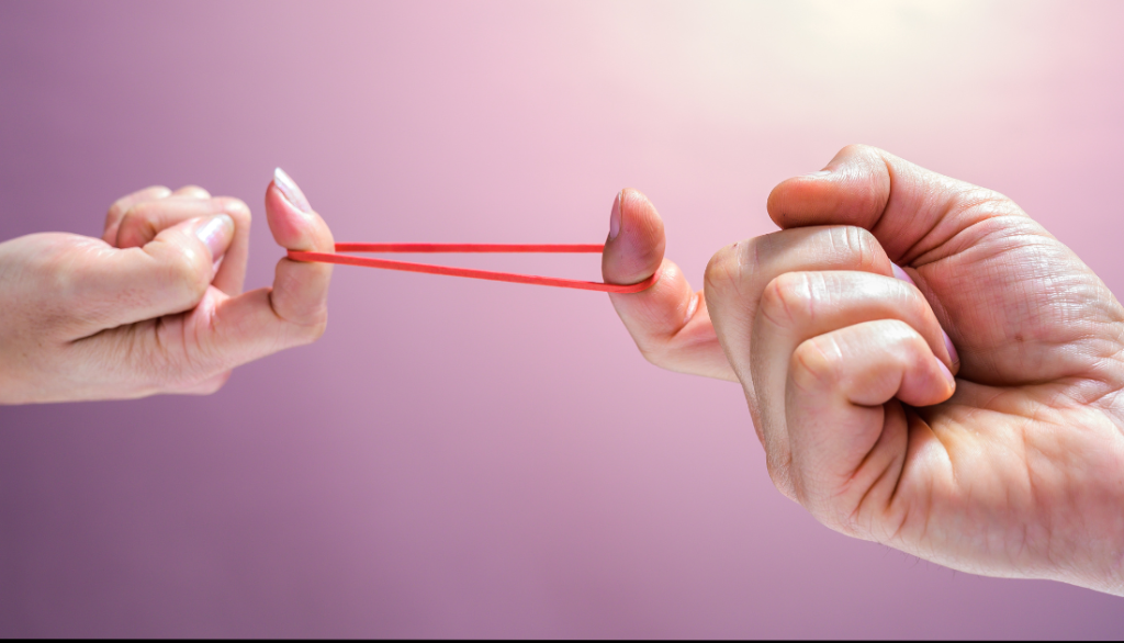 scalability and flexibility in business." "Rubber band being stretched, symbolizing scalability and flexibility in business."